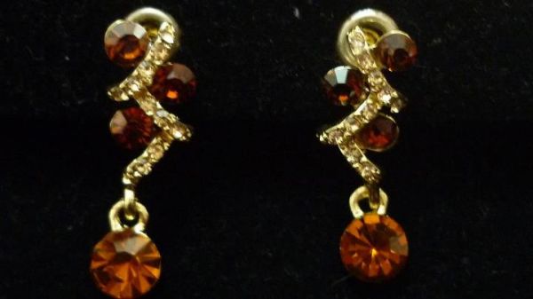 Brinco Zirconia