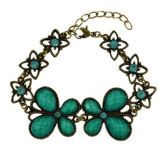 Pulseira dourado envelhecido com pedras verdes